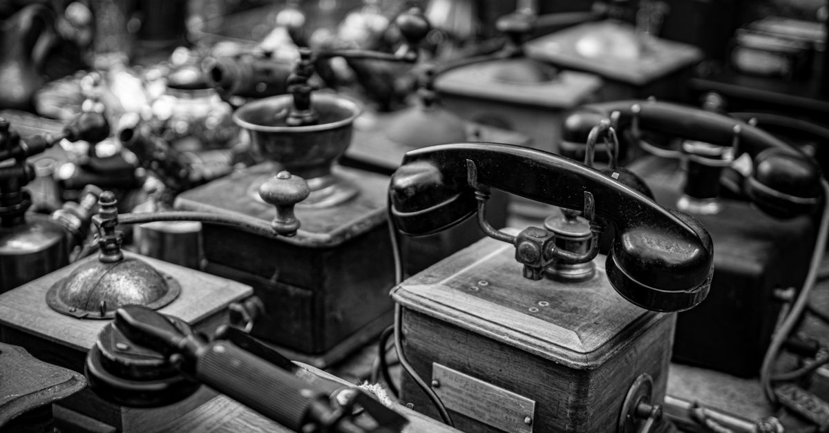 A collection of antique telephones in black and white. Captured in Madrid.